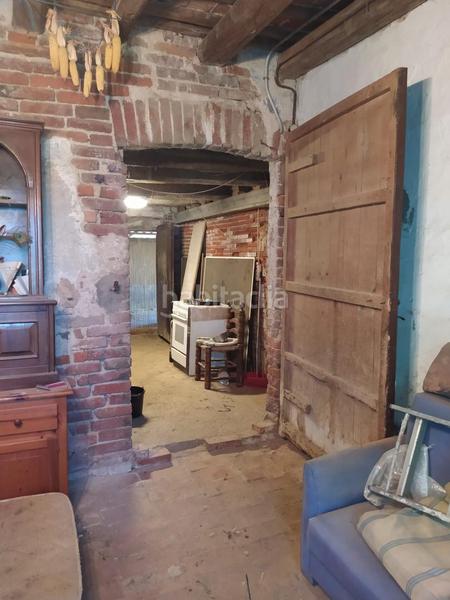 Foto d1eec5ee-126a-4f70-8c58-7594631f8ac1. Masia a Riells i Viabrea