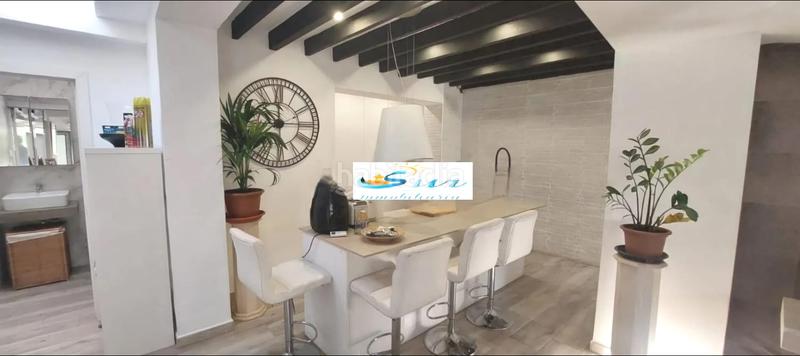 Foto 8fc89dd4-9dd9-4b1d-af2e-b87dffb6a5e2. Casa encanto andaluz junto al mar con garaje y dos terrazas en Torremolinos