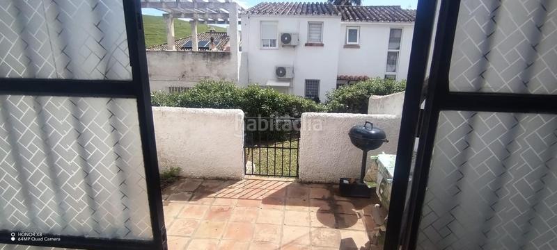 Foto 2764e18e-0d49-4ef8-9791-d81bb23a28d7. Maison jumelée dans Hipódromo - Cerrado del Águila Mijas