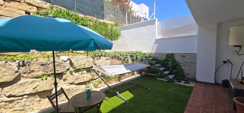 Foto 6fa53c80-6fa1-4fd4-a76a-6cb33ff498f0. Casa adossada amb calefacció aparcament piscina a Torremolinos