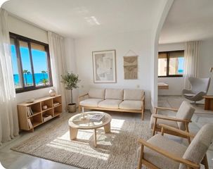 Piso en La Carihuela - Los Nidos. Exclusiva vivienda en primera línea de playa en la carihuela