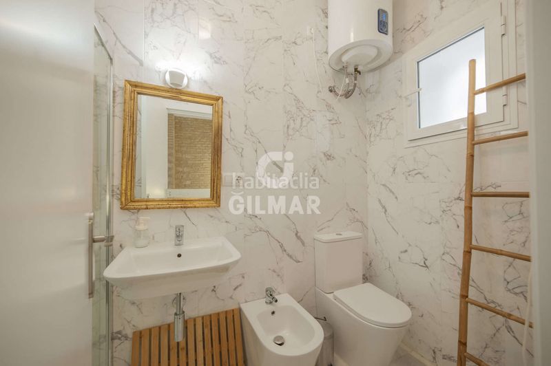 Foto 710b9433-4411-48f6-8497-075a2eb6d5b9. Casa aparellada amb calefacció a Feria Sevilla