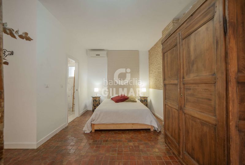 Foto b57fc7e8-2c89-4f61-a5eb-782452ee6c11. Casa aparellada amb calefacció a Feria Sevilla