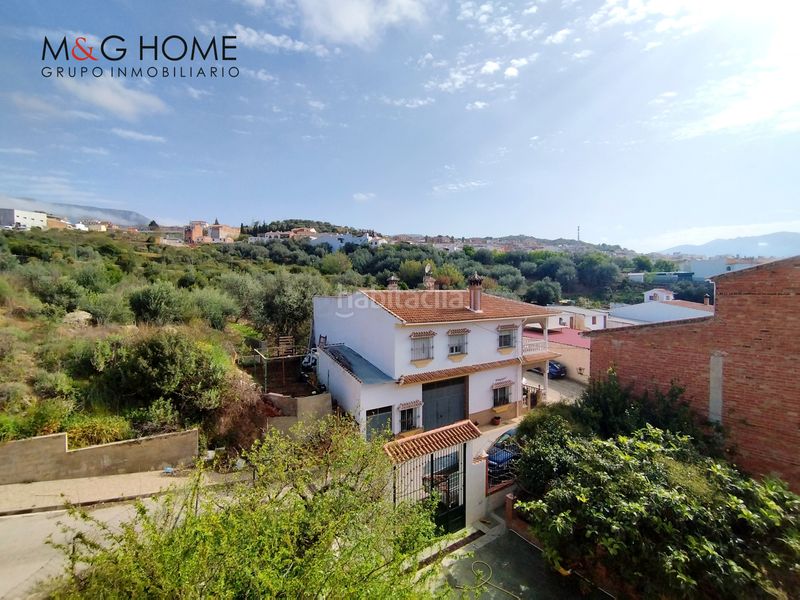 Foto 57253a42-e594-4084-ad1d-2613fa6fd609. Casa amb xemeneia aparcament a Periana