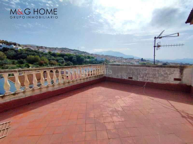 Foto c1aa2bb7-80c3-42f4-8fbd-96e79f4a4778. Casa amb xemeneia aparcament a Periana