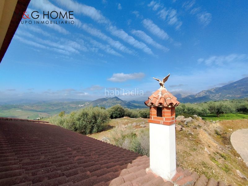 Foto e86fcdf2-9847-4fac-bd02-cf7e76feb5cf. Casa amb xemeneia aparcament a Periana
