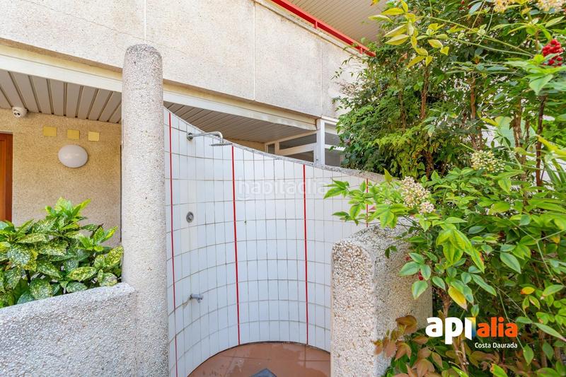 Foto 5aa9073b-5994-4d72-b647-bd316ff2ce4d. Planta baja bajos con jardin en paseo miramar primera linea. en Salou