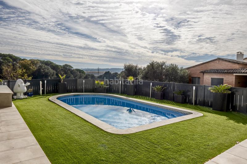 Foto 67bf1e7c-4ba1-490d-9975-b475cf03a6ca. Maison avec chauffage parking piscine dans Palau Girona