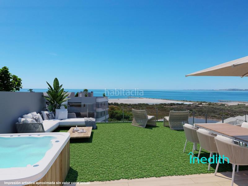 Foto d2064ccc-4759-4b77-bf0c-3e2e6e1bf627. Dachwohnung mit heizung parking pool in Playa Tamarit-Playa Lissa Santa Pola