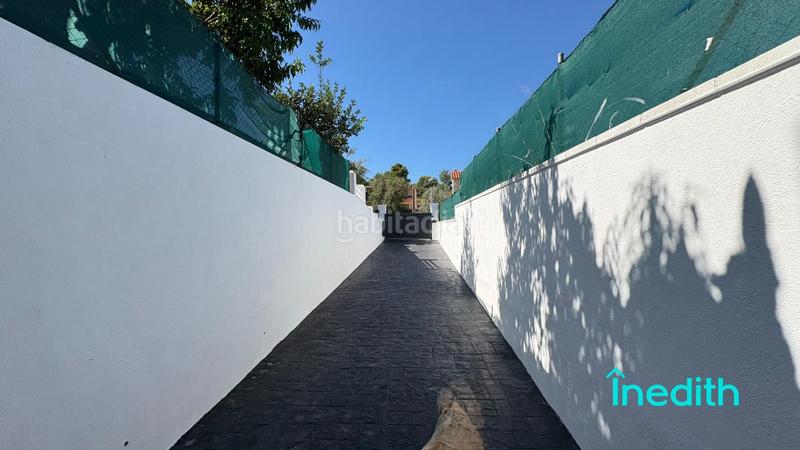 Foto 8a4a99f9-8a3d-420c-8ebd-561ba8bc58d1. Xalet amb calefacció aparcament piscina a costa Cunit - els jardins - els rosers Cunit