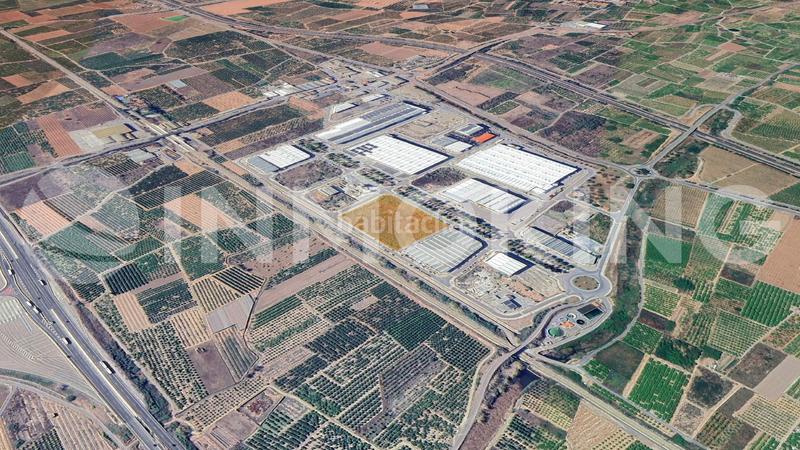 Foto 1bc69bd1-b0ac-4f97-91c6-653611bd3ddd. Solar industrial en av. proyecto s/n suelo industrial facahada a tres calles en venta en Quartell