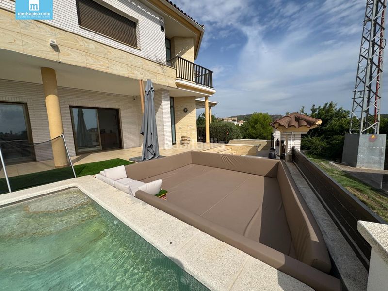 Foto 4b2aac1f-2662-4ed4-a1fa-d59eef3bdd00. Casa amb aparcament piscina a Ciutat jardí Bonanova Calafell