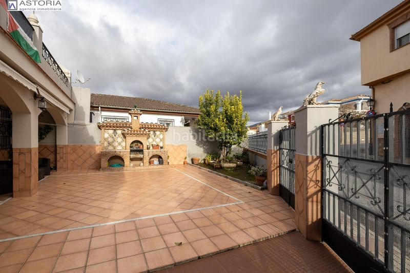 Foto e3c4d613-849f-42ac-837c-192c59aa7f68. Casa aparellada amb aparcament piscina a La Zubia Ciudad Zubia (La)