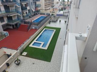 Apartament a Calle cuenca 10. Apartamento de 2 dormitorios con piscina en la playa el estañol