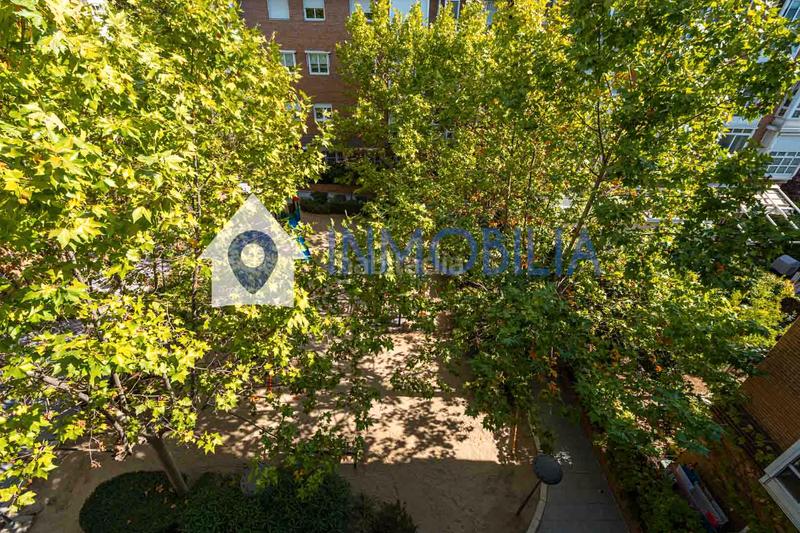 Foto cb00ae9d-7d02-471a-819a-4a98209f2574. Flat with heating pool in Corralejos-Campo de las Naciones Madrid