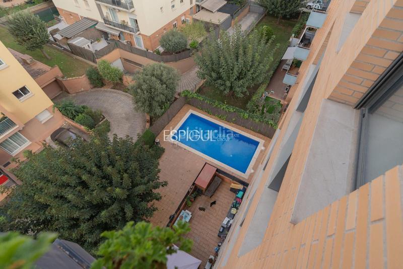 Foto c051ac7c-e614-48a7-915a-44a1d6ba2d2d. Attico con riscaldamento parcheggio piscina in Centre Salt