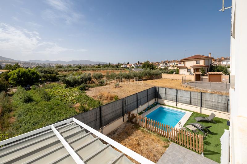 Foto 4151ba5b-1ef9-48a2-b025-250ae5f15372. Chalet con camino riscaldamento parcheggio piscina in Ogíjares