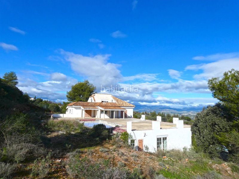 Foto 462231e1-c344-42c2-ac2a-755cf29786db. Casa amb piscina a Centro Alhaurín el Grande