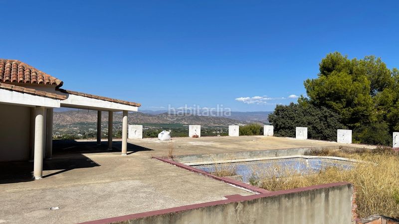 Foto c0f113c4-679c-42c0-bbf3-983d99ebc32f. Casa amb piscina a Centro Alhaurín el Grande