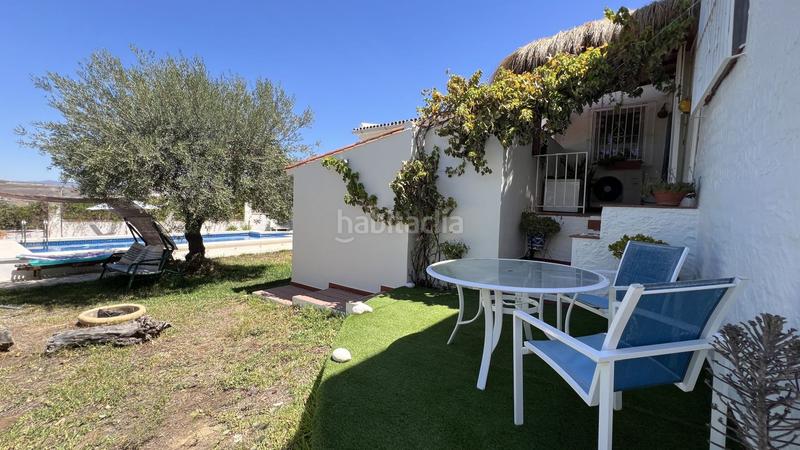 Foto 1ebb0cd6-7b76-46e6-afcd-22d9431a154a. Casa encantadora casa situada dentro de una pequeña urbanización, a solo unos minutos a pie del pintoresco pueblo en Alhaurín el Grande