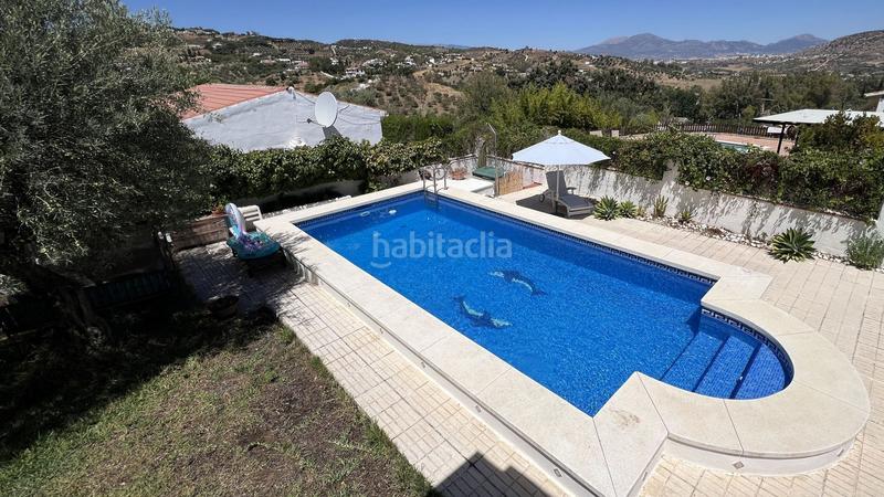 Foto 47c7c110-5010-4515-85b3-e3f9b4148db5. Casa encantadora casa situada dentro de una pequeña urbanización, a solo unos minutos a pie del pintoresco pueblo en Alhaurín el Grande