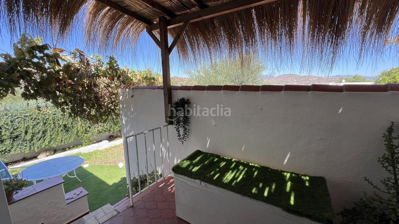 Foto ae6302f0-bc03-4bd9-8faa-142402c5c0c2. Casa encantadora casa situada dentro de una pequeña urbanización, a solo unos minutos a pie del pintoresco pueblo en Alhaurín el Grande