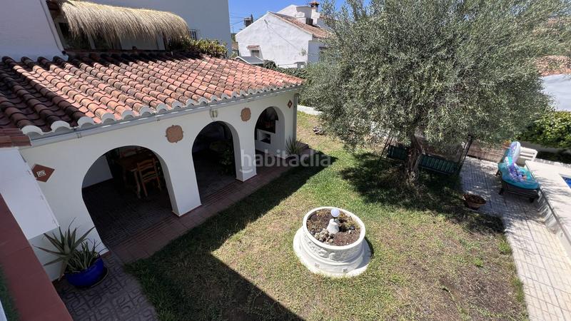 Foto ba879620-ac98-4776-bed1-719e524bcebf. Casa encantadora casa situada dentro de una pequeña urbanización, a solo unos minutos a pie del pintoresco pueblo en Alhaurín el Grande