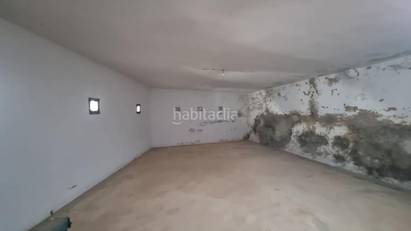 Foto 5d753e32-be4c-4c3f-a181-fc10b67a55df. Casa adosada gran casa adosada con azotea, patio, sótano y parking en venta en el Centro . ref th4943284 en Alhaurín el Grande