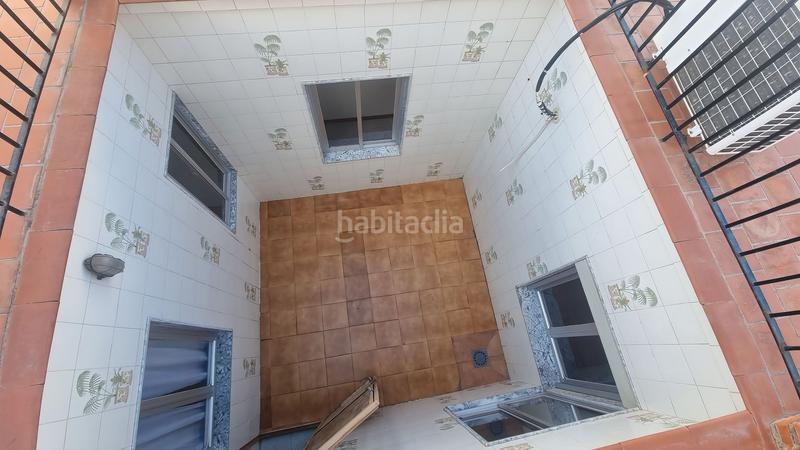 Foto 5e2bdcb3-0eca-49d8-b88c-b4c6f0ac641d. Casa adosada gran casa adosada con azotea, patio, sótano y parking en venta en el Centro . ref th4943284 en Alhaurín el Grande
