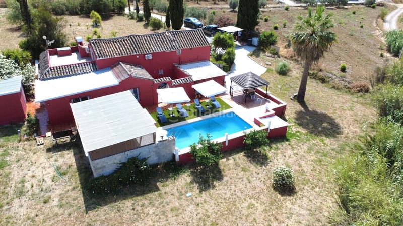 Foto 874bf794-0b7e-4d16-8057-f5b156a1f352. Country house with pool in Coín