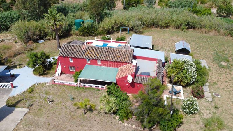 Foto 88933cb9-4263-4f61-a826-44db869a9aae. Country house with pool in Coín