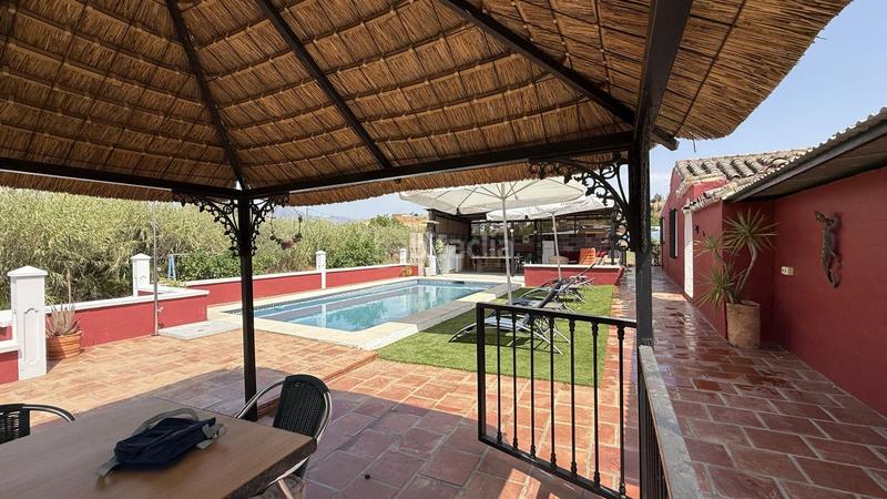 Foto a6f90810-53df-4b1c-b6b6-c0e0115bfbf7. Country house with pool in Coín