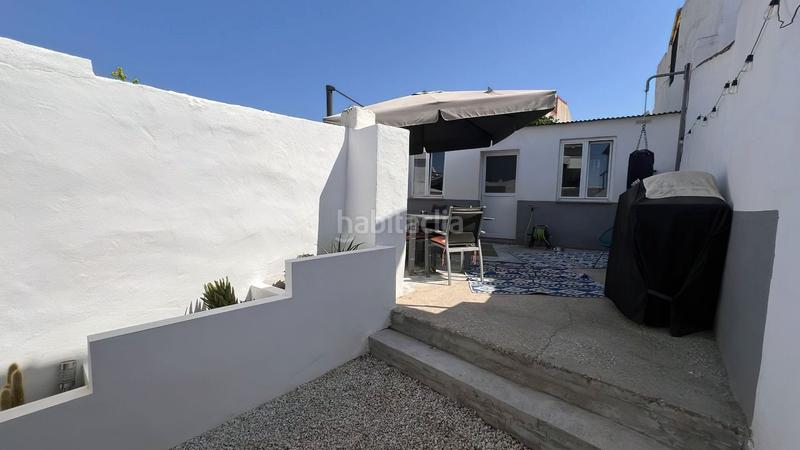 Foto 9b412c8c-f817-48cd-abdf-52fbfeca6688. Casa adossada a Centro Alhaurín el Grande