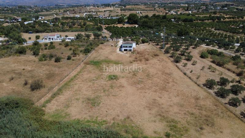 Foto bfc34e65-282a-4949-b283-fa127abd2635. Masía retiro rural con orientación sur, a solo minutos con 10,000m de terreno llano. ref f5147482. en Alhaurín el Grande