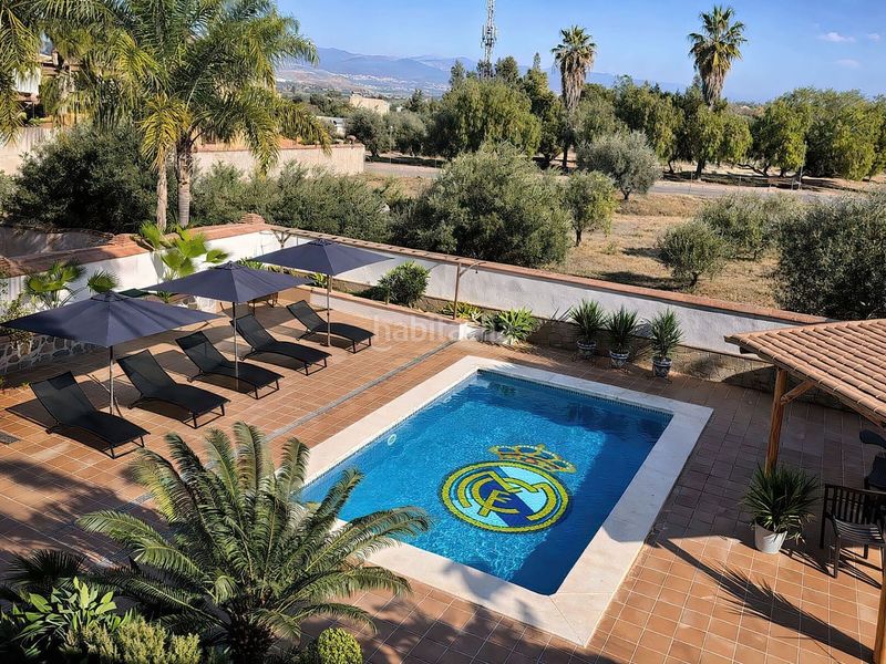 Foto d65dfdc8-a65e-4703-bef3-9616b54d39c9. Casa amb piscina a Centro Alhaurín el Grande