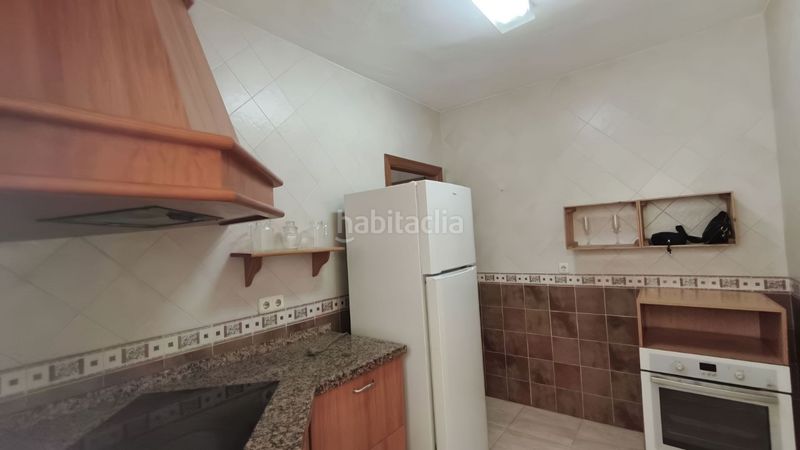 Foto 9abd6793-85d4-4ddd-9e44-fcd3fbb4181e. Casa adossada a Coín
