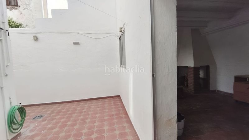 Foto bdec1b21-637e-4934-a09f-7d3885d6ccbc. Casa adossada a Coín
