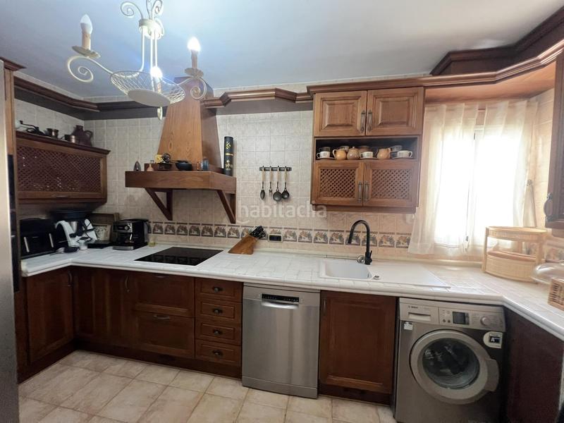 Foto ec62b324-19c5-4159-b6d4-731d96cb0fa1. Casa adossada amb aparcament piscina a campo de Mijas Mijas