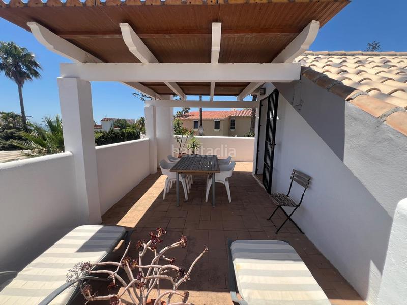 Foto ccead0bd-0e69-413a-b9aa-b27067aba015. Casa aparellada amb aparcament piscina a Torreblanca del Sol Fuengirola