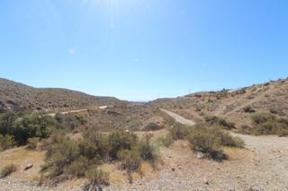 Finca rústica a Retamar. Una gran oportunidad! terreno rústico de 25000m2 en cuevas de la