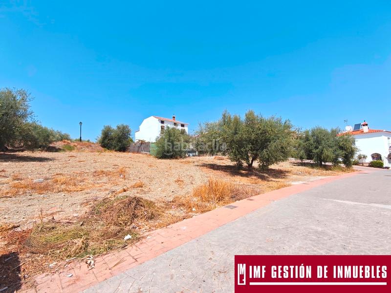 Foto a5e04cd7-e691-42c2-b108-176e6e37fea0. Terreny residencial a calle del parque 7 a Viñuela