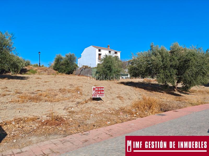 Foto 1e6c1e6e-e57a-42b0-bbd9-0fe7c0d63b15. Terreny residencial a calle del parque 13 a Viñuela