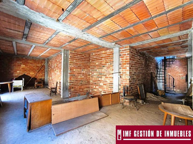 Foto 1ecad41f-27e8-420f-b2c3-b4b56a5cf060. Maison avec parking dans Benamocarra