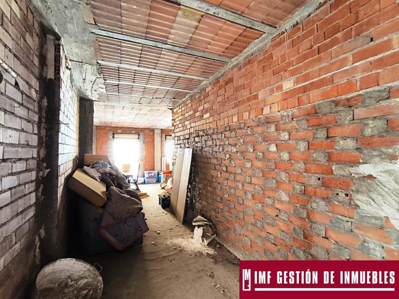 Foto a468dd21-e9f7-41d2-a7bc-badcf4b588dc. Maison avec parking dans Benamocarra