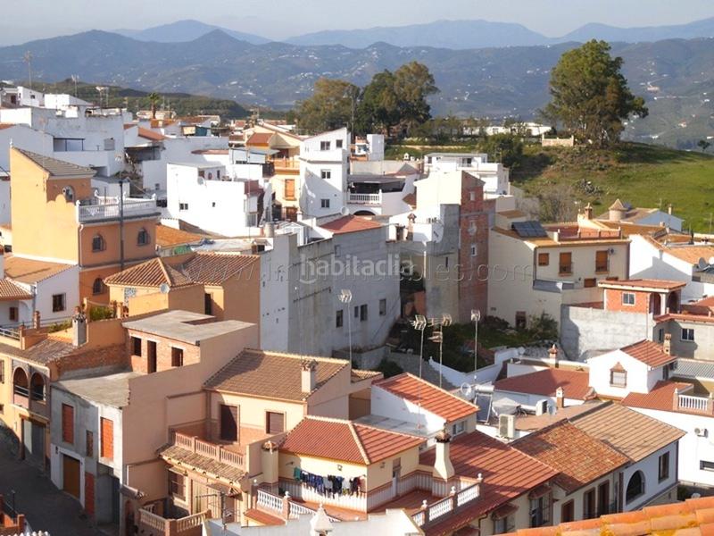 Foto ea378528-ffcf-4ff1-b4a4-6ca6154c7349. Maison avec parking dans Benamocarra