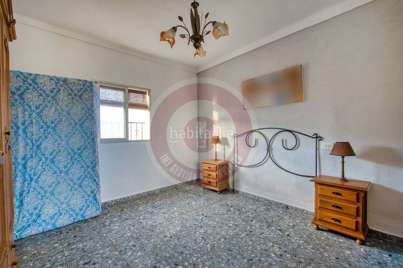 Foto be99fdb0-6a00-4ecd-965a-421056b5a6bc. Casa adossada amb aparcament a Benamargosa