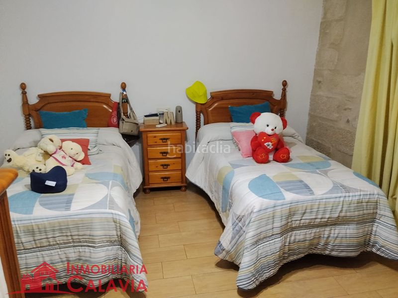 Foto c6a79d95-bc75-4d4d-99cb-65b9a9b02e89. Casa a calle pintada baja 12 a Baeza