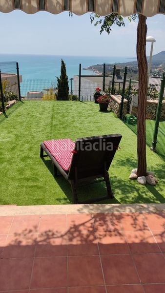 Foto 00c3eefe-3c51-4f71-81bd-e98aac034a40. Casa adossada a carrer de luruguai 5 a Las Atalayas-Urmi-Cerro Mar Peñíscola