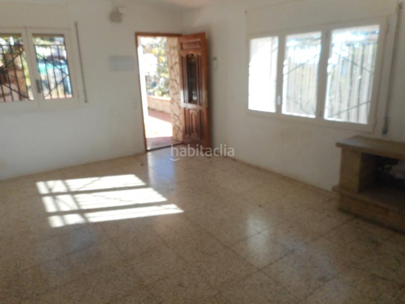 Foto c395ed56-c9f6-40e7-b24b-349dd86f0b86. Casa amb xemeneia aparcament a Vallirana