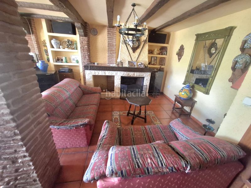 Foto 0b2ab400-adb4-4060-861e-da8a1ff6af2f. Casa adossada amb xemeneia calefacció aparcament piscina a Jaén